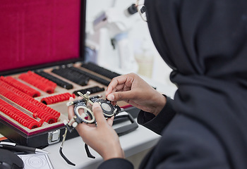 Image showing Glasses, lens and test with ophthalmologist tools, trial frame with woman hands, healthcare for eyes and prescription. Optometry, eye care and Muslim optometrist, medicine and chart with measurement