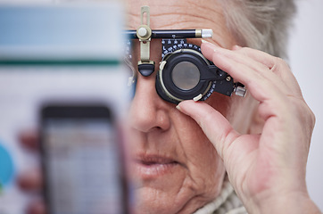 Image showing Eye exam, vision and senior woman with lens in clinic for testing eyes, eyesight and optical assessment. Optometry, healthcare and elderly patient reading for optician, medical care and trial glasses