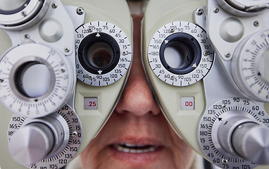 Image showing Eye exam, vision and face of woman with optometrist for test, eyesight and optical assessment. Optometry, clinic and zoom of senior patient with eyes in optician machine, phoropter and medical lens