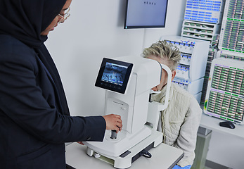 Image showing Optometry, screen for eye exam and optician with patient for vision test, eyesight and optical assessment. Healthcare, ophthalmology and optometrist with medical camera for eyes scan of senior woman
