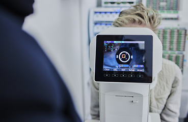 Image showing Optometry, digital screen for eye exam and woman with machine for vision test, eyesight and optical assessment. Healthcare, ophthalmology and optometrist with patient in medical camera for eyes scan