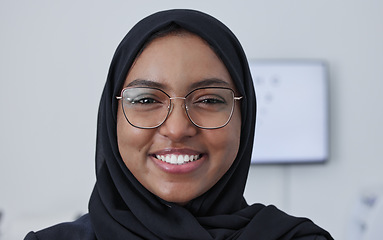 Image showing Hijab, muslim woman smile and portrait in a consulting doctor office ready for eye test with chart. Healthcare, eyes wellness and proud clinic worker face from company vision and job success