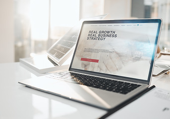 Image showing Laptop screen, business strategy and table in office with solar panel in empty company workplace. Real growth, website and computer or pc on desk with information and ui for web or internet site.