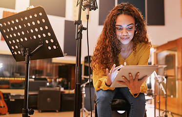 Image showing Musician, woman or tablet for song writing in recording studio for album, night performance or radio industry. Smile, happy or singer on technology for artist singing lyrics, production or research