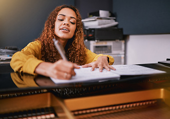 Image showing Musician, paper or song writing on piano in recording studio for album recording, concert performance or radio industry. Woman, singer or pianist and artist sheets for production, melody or jazz idea