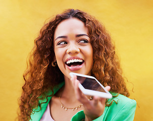 Image showing Phone, loudspeaker and woman talking on yellow background, color wall and backdrop. Trendy female, mobile voice recording and communication on smartphone, audio chat and happy speech on cellphone mic