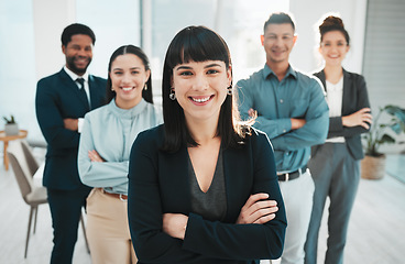 Image showing Portrait, collaboration and management with a leader woman and her team standing arms crossed in the office. Vision, teamwork or diversity and a female manager posing at work with her employee group
