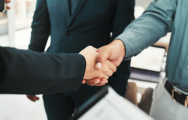 Image showing Handshake, business partnership and agreement closeup, collaboration or b2b welcome, thank you and clients meeting. People shaking hands in job interview, career promotion or hiring deal with success