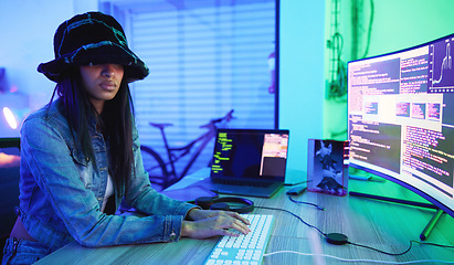 Image showing Programming, software and data with a black woman developer working in a neon office for information technology. Computer, cyber security and database with a female programmer typing code for an app