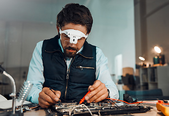 Image showing Electric meter, motherboard and IT professional or engineer repair chip or electronic device in a workshop or shop. Person, man and guy fixing hardware of a computer for technology in a lab