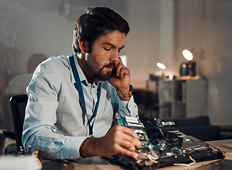 Image showing Technology, repair and thinking with an man fixing a device in an office for electrical or engineering. Laptop, information technology and service with a male it professional working on maintenance