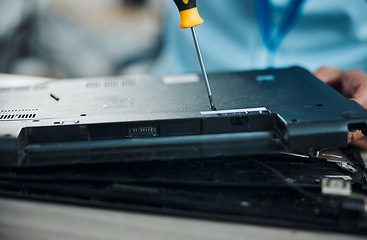 Image showing Laptop, technician and fixing with screwdriver, technology maintenance and repair hardware of pc. Tech support person with tools and upgrade, technical problem and electronics, digital and zoom