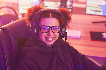 Image showing Gamer, portrait and young girl smile with headphones in home of esports, online games or virtual competition. Happy female, live streamer and gaming with headset in neon lighting, technology or gen z