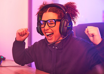Image showing Winner, streamer or woman gamer success on computer with microphone celebrating game win or fist bump. Happy or esport girl player celebration for online competition, gaming progress or achievement