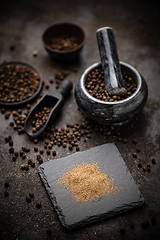 Image showing Whole and milled black pepper