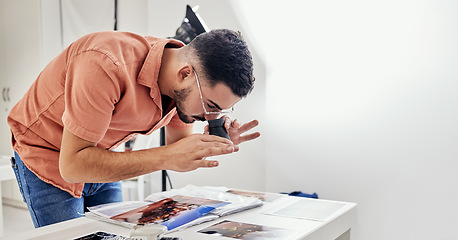 Image showing Photography, editing and man photographer in a studio working on fashion or creative images. Art, creativity and male analyzing pictures from a photoshoot at a digital, design or production agency.