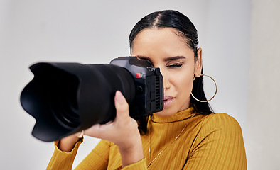 Image showing Black woman, photographer and camera for photoshoot, digital agency and production process. Photography, African American female and artist with device to shoot in studio, creative media and employee