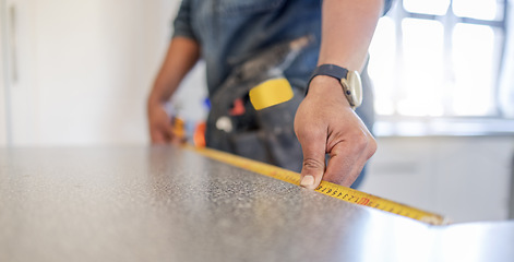 Image showing Carpenter, work table and measure tape with hands, design diy and home improvement for building, wood or job. Builder, construction worker and handyman by countertop, planning and vision in workplace