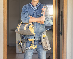 Image showing Handyman, tool bag and arms crossed at work with goals, property development and real estate maintenance. Construction worker, tools and renovation industry with service, vision and home improvement