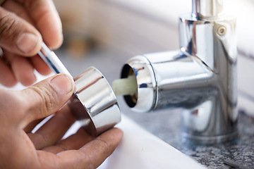 Image showing Plumber, hands and faucet, plumbing and maintenance with man, manual labour closeup and home renovation. Construction trade, handyman with kitchen or bathroom sink with hardware, pipe and DIY