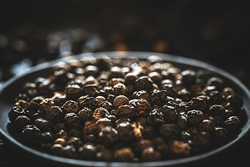 Image showing Pile of black peppercorns