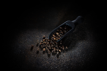 Image showing Scattered black pepper