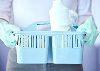 Image showing Woman, hands and cleaning tools in basket for housekeeping or detergent with latex gloves at home. Hand of female cleaner with bucket of clean chemicals for domestic work, dirt removal and hygiene