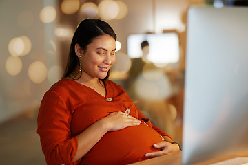 Image showing Pregnant, stomach and business woman in office on computer excited, happy and smile for baby. Corporate work, pregnancy and female worker hands on abdomen for love, affection and hope late at night