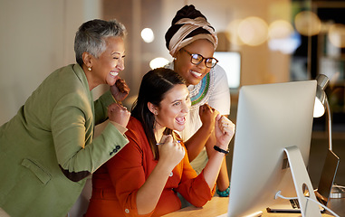 Image showing Creative business people, computer and celebration for winning, good news or team promotion at office desk. Group of women designers smile celebrating bonus, win or teamwork success by PC in startup