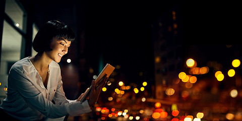 Image showing Smile, night and tablet with woman on rooftop for research, social media and networking app. Technology, internet and website with girl outside for email, communication and data in city bokeh mockup