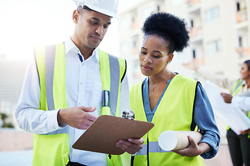 Image showing Clipboard, construction and team of people planning paperwork of property, engineering and architecture. Black woman, man and project management for industrial buildings, collaboration and logistics