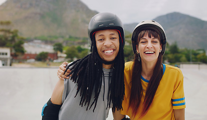 Image showing Portrait, hug and friends skate in park, smile and helmets for training, fun and cheerful together. Fitness, black man or woman embrace, skating and laughing with hobby, recreation and relax outdoor