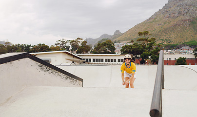 Image showing Skating, sports and fun with a woman athlete at a skatepark for recreation or leisure during summer. Fitness, health or energy and a young female skating outdoor at speed with balance and skill