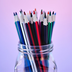 Image showing Creativity, art and drawing pencil container for school coloring stationery zoom. Closeup of a glass jar with color pencils in purple gradient studio background for creative education.