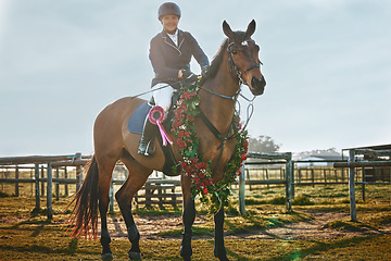 Image showing Woman, equestrian winner portrait and pet horse in green countryside and field. Animal, young jockey win an award at competition or show of a rider and athlete with outdoor with sports with horses