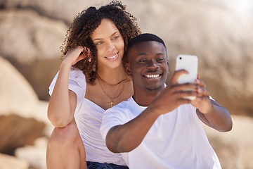 Image showing Black couple, selfie and beach with a woman and man together taking a social media profile picture. Love, care and summer travel of young people outdoor with freedom on a holiday with happiness