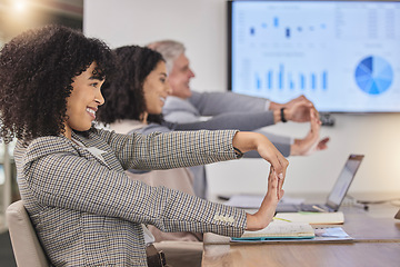 Image showing Business people, desk and stretching arms at meeting for finance, budget and accounting presentation. Group, corporate team building and diversity with exercise for stress, muscle and healthy mindset