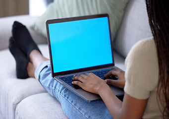 Image showing Woman, home and laptop with green screen on couch for streaming internet, website or news. Person with technology mockup on sofa for learning, education course and search to watch movie with wifi