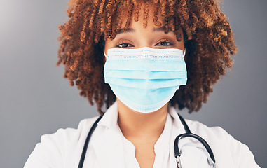 Image showing Portrait, healthcare and black woman with mask, wellness and protection against grey studio background. Face cover, African American female doctor and medical professional with safety regulations