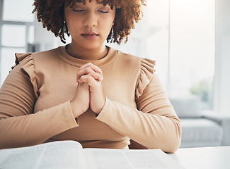 Image showing Prayer, black woman and holy book for religion, faith and god help, support and spiritual healing at home. Praying hands, hope and christian person with bible education for hope, trust and worship