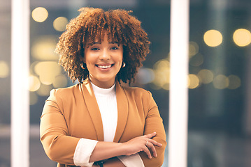 Image showing Business, smile and portrait of black woman in office at night with crossed arms for working, startup and career. Leadership, success and female worker with happy mindset, attitude and company pride