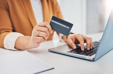 Image showing Hands, laptop and office with credit card for black woman, e-commerce and shopping on web with cybersecurity. Corporate executive, computer and ecommerce for sale, discount and fintech at workplace