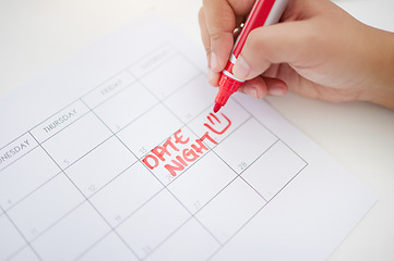 Image showing Hands, writing and calendar planning date for schedule, commitment or organized reminder on paper. Hand of person with red marker to write plan, time or day for operation, goals or monthly planner