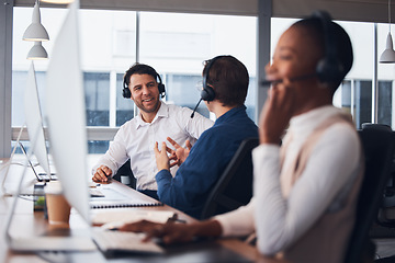 Image showing Call center, telemarketing and employees talking, customer service and explain system in office. Team, coworkers and consultants in workplace, tech support and conversation for process and training