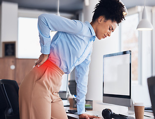 Image showing Back pain, office and business black woman with injury, muscle ache and spine problem standing at desk. Medical emergency, stress and tired female worker massage body for strain, tension and accident