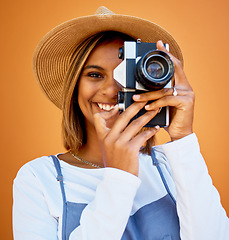 Image showing Portrait, photographer and black woman with camera, smile and creative against studio background. Face, African American female artist or lady with device, happiness or freelancer with casual clothes