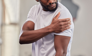 Image showing Shoulder pain, fitness and black man with injury in gym after accident, workout or training. Sports, health and male athlete with fibromyalgia, inflammation or arthritis, tendinitis or painful arm.