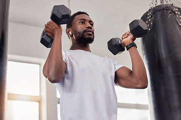 Image showing Earphones, exercise music and black man with dumbbells in gym for workout, training or fitness. Sports, bodybuilder and male athlete streaming radio podcast while lifting weights for muscle strength.