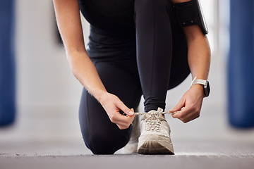 Image showing Hands, shoes and person with laces in preparation of fitness, running and morning cardio outdoors. Sneakers, runner and athletic people workout in a city for wellness, cardio and marathon training