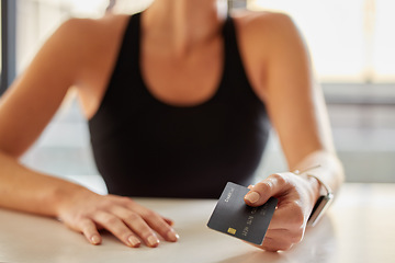 Image showing Hands, credit card and payment at gym for fitness membership or exercise subscription. Fintech, ecommerce and athlete or woman buying or paying for workout or training at exercising club for health.